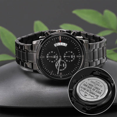 Engraved black chronograph watch